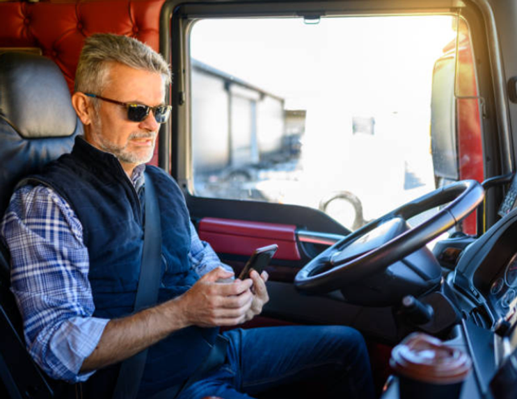 Office chairs and desk in modern workspace with blurred person walking